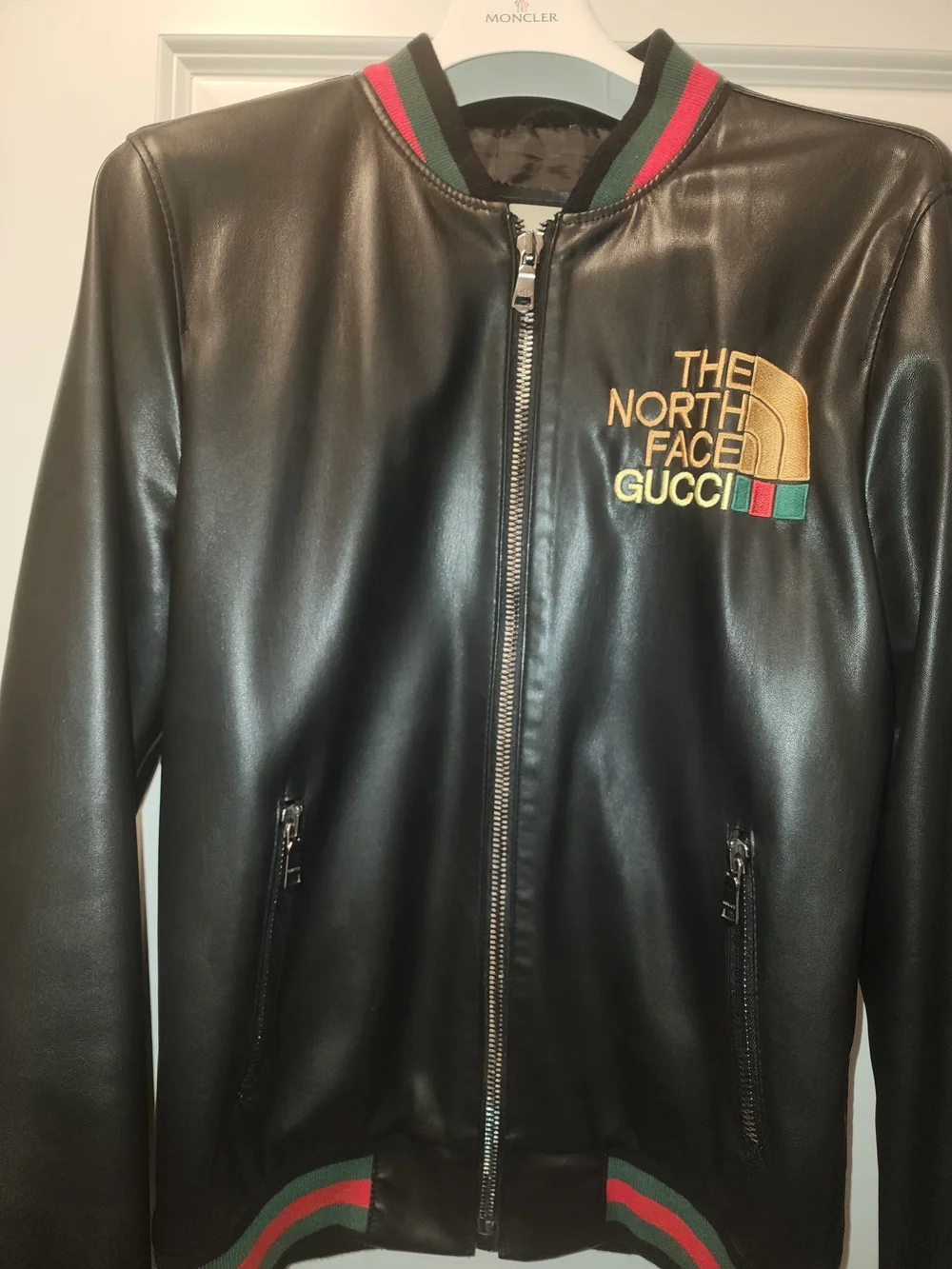 Gucci Black Leather Bomber Jacket with Gold Logo and Red-Green Trim
